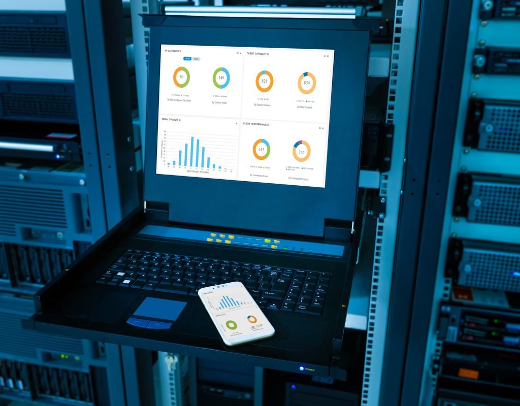 monitor of Computer and mobile phone show graph information of network traffic and status of device in server room data center. blue tone
