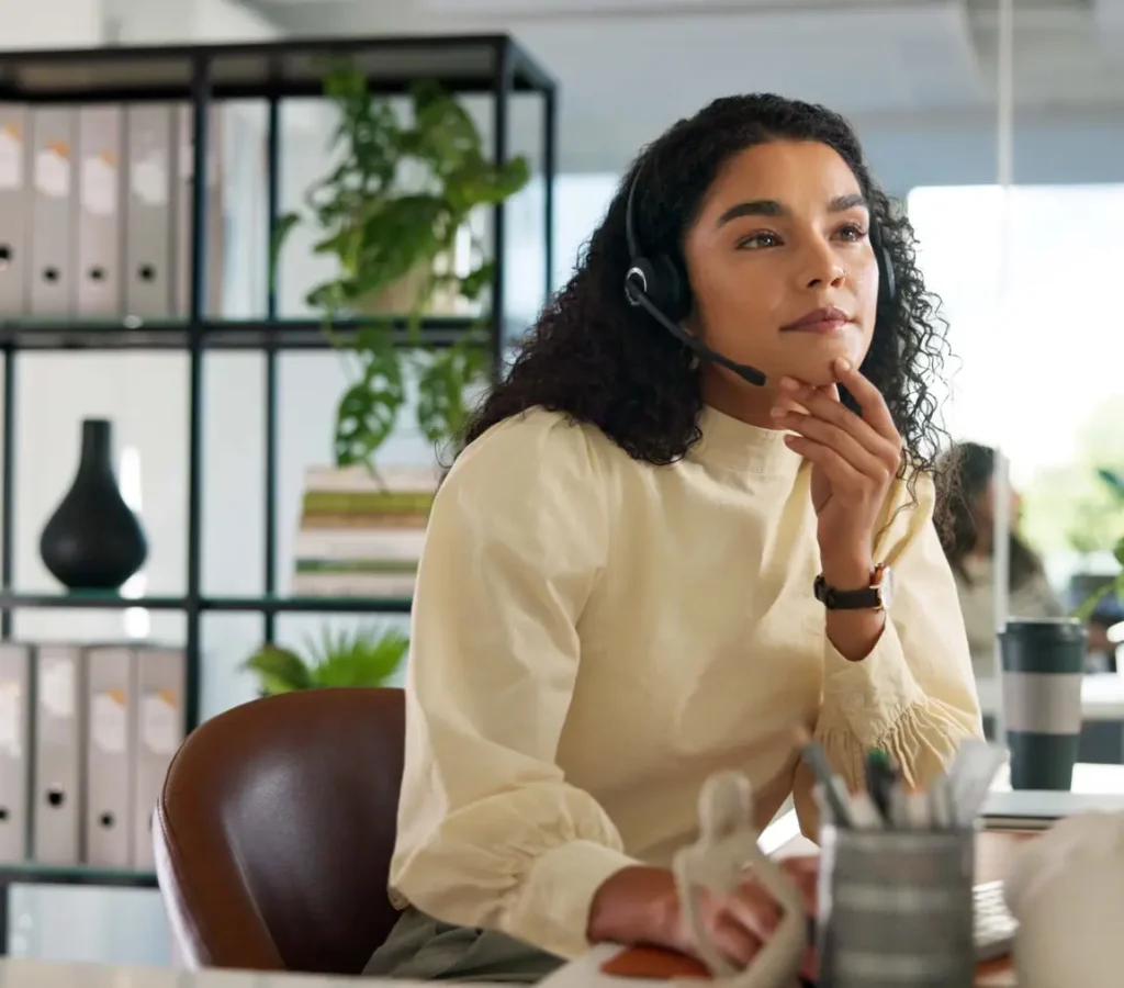 CRM, woman and customer service in office with computer, communication and online consulting. Typing, virtual chat or call center for contact support, help desk or sales agent for hotline business